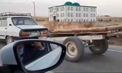Arabayı at yerine otomobille çekti