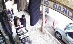 Deniyormuş gibi yaptığı yelekleri çaldı, kameraya yakalandı
