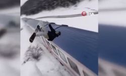 Snowboardla Doğu Ekspresi’nin üzerinden atladı