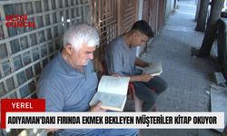 Adıyaman'daki fırında ekmek bekleyen müşteriler kitap okuyor