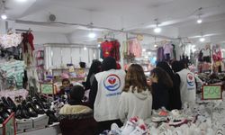 Cizre'de yetim çocuklara bot ve mont desteği
