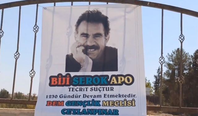 Mezarlık duvarına terörist başı Öcalan’ın posteri asıldı