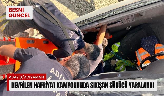 Devrilen hafriyat kamyonunda sıkışan sürücü yaralandı